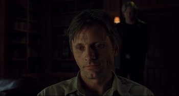 Movie still from “A History of Violence” (2005), directed by David Cronenberg – A person wearing a shirt; Close Up shot, Over the shoulder angle