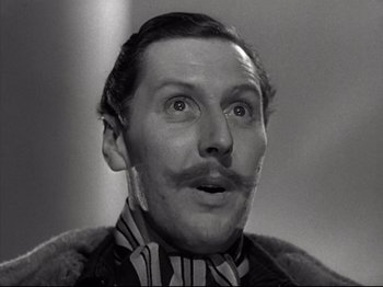 Movie still from “A Matter of Life and Death” (1946), directed by Emeric Pressburger – An old man with a mustache and a beard; Close Up shot, Low angle