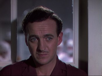 Movie still from “A Matter of Life and Death” (1946), directed by Emeric Pressburger – A person with a mustache; Close Up shot, Low angle