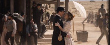 Movie still from “A Million Ways to Die in the West” (2014), directed by Seth MacFarlane – A man and a woman dressed in old time clothing; Wide shot, Over the shoulder angle