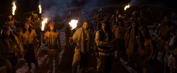 Movie still from “A Million Ways to Die in the West” (2014), directed by Seth MacFarlane – A group of people standing in the dirt; Wide shot, High angle