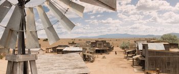 Movie still from “A Million Ways to Die in the West” (2014), directed by Seth MacFarlane – An old western town with a windmill in the background; Extreme Wide shot, High angle