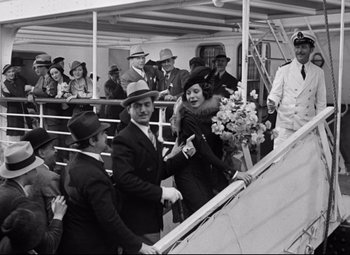 Movie still from “A Night at the Opera” (1935), directed by Sam Wood – A group of people standing on a boat in the water; Wide shot, High angle