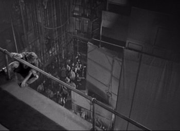 Movie still from “A Night at the Opera” (1935), directed by Sam Wood – A group of people sitting in a room; Wide shot, High angle