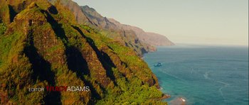 Movie still from “A Perfect Getaway” (2009), directed by David Twohy – A view of the ocean from a mountain side; Extreme Wide shot, Overhead angle