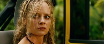 Movie still from “A Perfect Getaway” (2009), directed by David Twohy – A person with long blonde hair; Close Up shot, Low angle