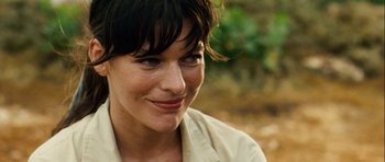 Movie still from “A Perfect Getaway” (2009), directed by David Twohy – A person with short black hair; Close Up shot, Over the shoulder angle