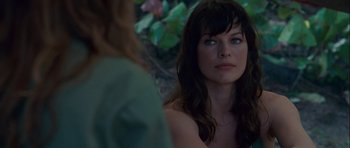 Movie still from “A Perfect Getaway” (2009), directed by David Twohy – A beautiful woman sitting in front of another beautiful woman; Close Up shot, Over the shoulder angle