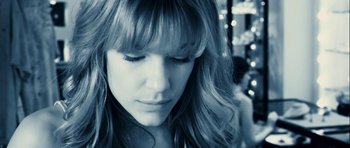 Movie still from “A Perfect Getaway” (2009), directed by David Twohy – A person with long hair; Close Up shot, Low angle