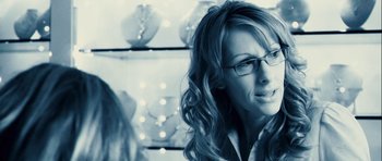 Movie still from “A Perfect Getaway” (2009), directed by David Twohy – A person wearing glasses; Close Up shot, Over the shoulder angle