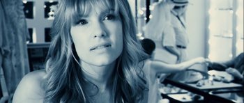 Movie still from “A Perfect Getaway” (2009), directed by David Twohy – A person with long brown hair; Close Up shot, Over the shoulder angle