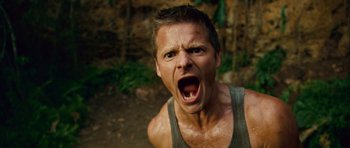Movie still from “A Perfect Getaway” (2009), directed by David Twohy – A person with his mouth wide open; Close Up shot, Low angle