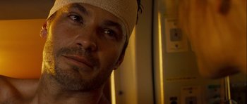 Movie still from “A Perfect Getaway” (2009), directed by David Twohy – A person wearing a head band; Close Up shot, Low angle
