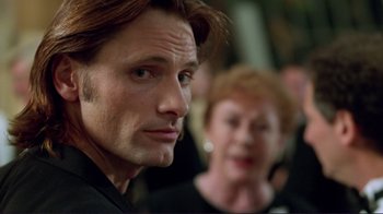 Movie still from “A Perfect Murder” (1998), directed by Andrew Davis – A man and a woman looking at the camera; Close Up shot, Over the shoulder angle