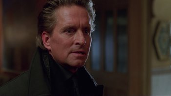 Movie still from “A Perfect Murder” (1998), directed by Andrew Davis – A person wearing a jacket; Close Up shot, Low angle