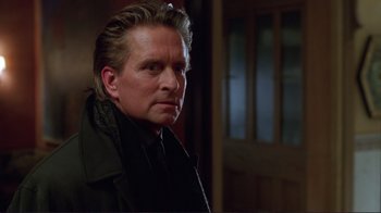 Movie still from “A Perfect Murder” (1998), directed by Andrew Davis – A person with long hair; Close Up shot, Over the shoulder angle