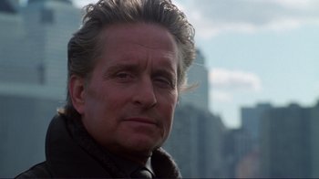 Movie still from “A Perfect Murder” (1998), directed by Andrew Davis – A person wearing a jacket; Close Up shot, Low angle