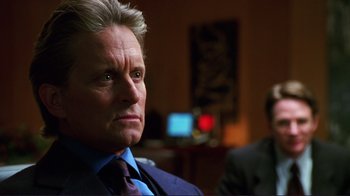 Movie still from “A Perfect Murder” (1998), directed by Andrew Davis – An older man in a suit and tie looking into the distance; Close Up shot, Over the shoulder angle