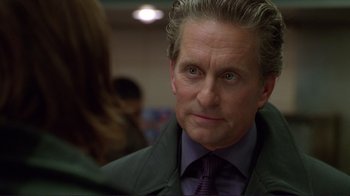 Movie still from “A Perfect Murder” (1998), directed by Andrew Davis – A man that is looking at the camera; Close Up shot, Over the shoulder angle