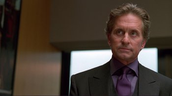 Movie still from “A Perfect Murder” (1998), directed by Andrew Davis – A person wearing a suit and purple tie; Close Up shot, Low angle