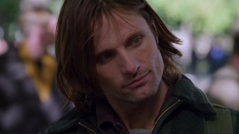Movie still from “A Perfect Murder” (1998), directed by Andrew Davis – A person with long brown hair; Close Up shot, Over the shoulder angle