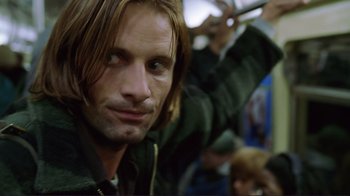 Movie still from “A Perfect Murder” (1998), directed by Andrew Davis – A person with long brown hair; Close Up shot, Low angle