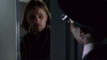 Movie still from “A Perfect Murder” (1998), directed by Andrew Davis – A person looking at another person; Close Up shot, Over the shoulder angle