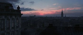 Movie still from “A Royal Affair” (2012), directed by Nikolaj Arcel – A view of a city at dusk or dawn; Extreme Wide shot, High angle