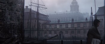 Movie still from “A Royal Affair” (2012), directed by Nikolaj Arcel – A tall ship in the middle of a foggy city street; Extreme Wide shot, Low angle