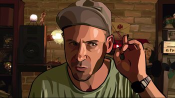 Movie still from “A Scanner Darkly” (2006), directed by Richard Linklater – A man with a baseball cap is holding his ear; Close Up shot, Overhead angle