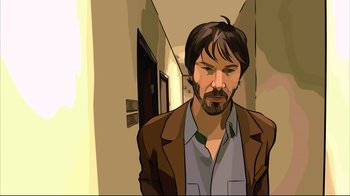 Movie still from “A Scanner Darkly” (2006), directed by Richard Linklater – A man with a beard is standing in a hallway; Close Up shot, Overhead angle