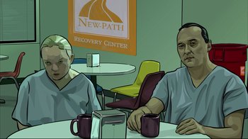 Movie still from “A Scanner Darkly” (2006), directed by Richard Linklater – Two people sitting at a table with coffee cups; Close Up shot, High angle