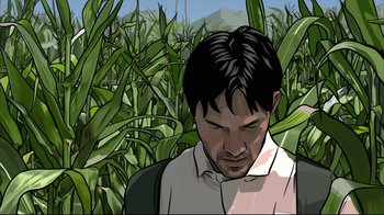 Movie still from “A Scanner Darkly” (2006), directed by Richard Linklater – An illustration of a man standing in a corn field; Close Up shot, Overhead angle