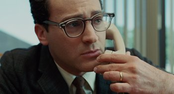 Movie still from “A Serious Man” (2009), directed by Joel Coen – A person wearing glasses and a ring; Close Up shot, High angle