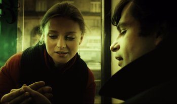 Movie still from “A Short Film About Killing” (1988), directed by Krzysztof Kieslowski – A woman and a man are looking at each other; Close Up shot, Over the shoulder angle