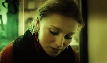 Movie still from “A Short Film About Killing” (1988), directed by Krzysztof Kieslowski – A person wearing a sweater; Close Up shot, Low angle