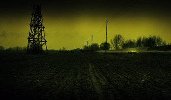 Movie still from “A Short Film About Killing” (1988), directed by Krzysztof Kieslowski – A field that has some power lines in it; Extreme Wide shot, Low angle