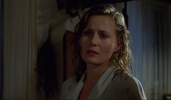 Movie still from “A Short Film About Love” (1988), directed by Krzysztof Kieslowski – A person wearing a white shirt; Close Up shot, Over the shoulder angle