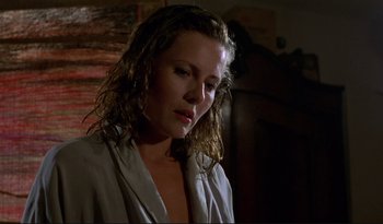 Movie still from “A Short Film About Love” (1988), directed by Krzysztof Kieslowski – A woman with wet hair looking down at the floor; Close Up shot, Low angle