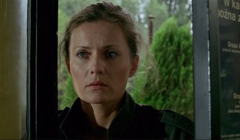 Movie still from “A Short Film About Love” (1988), directed by Krzysztof Kieslowski – A person with blue eyes; Close Up shot, Low angle