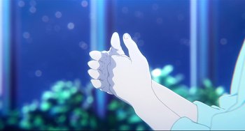 Movie still from “A Silent Voice: The Movie” (2016), directed by Taichi Ishidate – An illustration of a person holding their hands up in the air in front of the ocean; Extreme Close Up shot, High angle