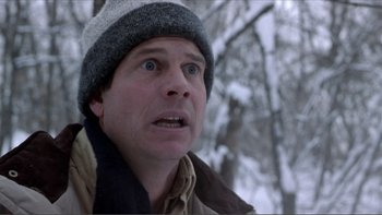 Movie still from “A Simple Plan” (1998), directed by Sam Raimi – A person wearing a hat; Close Up shot, Low angle