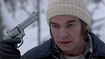 Movie still from “A Simple Plan” (1998), directed by Sam Raimi – A man holding a gun up to his head; Close Up shot, High angle