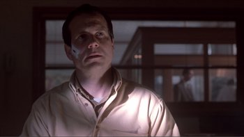 Movie still from “A Simple Plan” (1998), directed by Sam Raimi – A man with a bandage on his face looking up; Close Up shot, Low angle