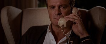 Movie still from “A Single Man” (2009), directed by Tom Ford – A person talking on a phone; Close Up shot, High angle