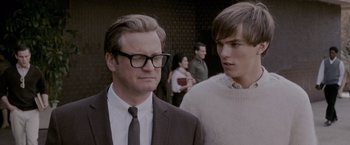 Movie still from “A Single Man” (2009), directed by Tom Ford – A man and a woman standing next to each other; Close Up shot, Over the shoulder angle