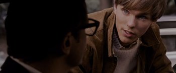 Movie still from “A Single Man” (2009), directed by Tom Ford – A man in a brown jacket and a man in a brown jacket; Close Up shot, Over the shoulder angle