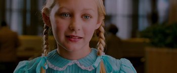 Movie still from “A Single Man” (2009), directed by Tom Ford – A young girl with a braid; Close Up shot, Low angle