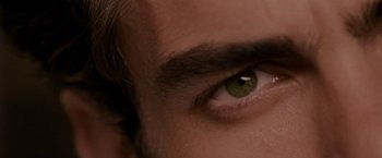 Movie still from “A Single Man” (2009), directed by Tom Ford – A man's eye with green eyes; Extreme Close Up shot, Overhead angle
