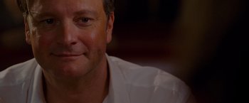 Movie still from “A Single Man” (2009), directed by Tom Ford – A man's face in a white shirt; Close Up shot, Over the shoulder angle